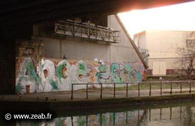 Belle fresque Ange - Zeab. Au bord du canal de Saint Denis, ANGE par SKOFE et ZEAB par Febray, 2001. Reposez en paix